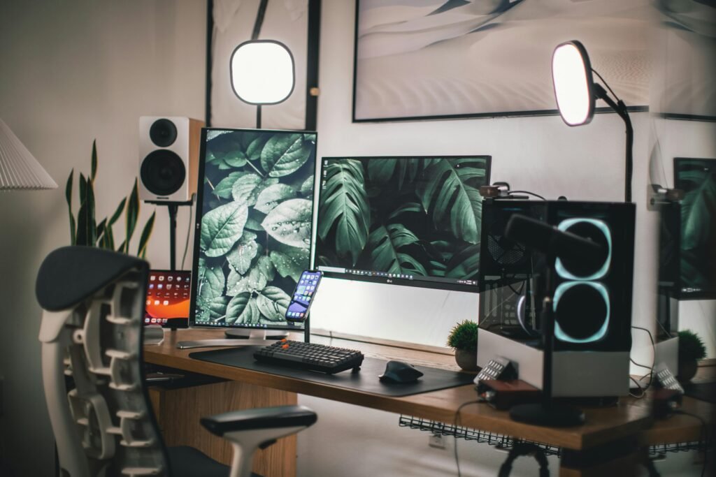pexels-photo-7238759-7238759 Stylish gaming and streaming setup with dual monitors, PC, and accessories.